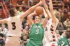 Wasilla junior Cole Schierman, left, and Connor Devine block
Colony sophomore Jared Turner’s push to the basket during Tuesday’s
game at Wasilla High School. ROBERT DeBERRY/Frontiersman