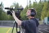 Colony High School media student Sam Curlin works the camera during filming of the Colony-Soldotna varsity football game August 21, 2015. Curlin and some of his classmates will facilitate a l