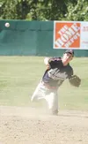 Alaska Road Warrior second baseman Chris Bydlon makes a throw to
first base during Saturday's game against the Chugiak Mustangs at
McManus Field in Wasilla. Chugiak starting pitcher Connor Sp