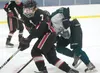 Houston forward Jon Lovelace skates the puck up the ice during a game against Colony earlier this year. Last Saturday, Lovelace scored four times to lead Houston to a 6-3 win over Hutchison i