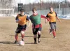 Members of the Wasilla Warriors soccer team practice on a cleared field behind Wasilla High School Monday afternoon. Robert DeBerry/Frontiersman