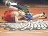 Wasilla's John Olsen wrestles with Kodiak's Dennis Bryant during
the 215-pound final of the Region III wrestling tournament in
Wasilla last weekend. Local schools have been wrestling with way