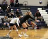 Palmer's Riley Thompson picks up the dig during a 3-2 win over Colony. Courtesy of Bruce Eggleston/matsusports.net