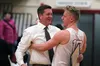 Wasilla High boys basketball assistant coach Mike Devine celebrates with his son Reilly after the Warriros earned a Northern Lights Conferene title in March. Reilly Devine announced he will p