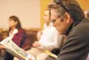 Mike Dunleavy, candidate for state Senate Seat D, looks at a map for the proposed Susitna State Forest during a meeting Saturday at the AT&amp;T Sports Center. The meeting, organized by Sen. 