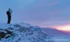 Tracy Kalytiak snaps a photo of a sunset after hiking with Lisa
Rodgers to the top of Bodenburg Butte early in November. Rodgers
and Kalytiak are Palmer mothers who collaborate on a local hik