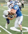 Palmer's Chase Ferris tries to break a tackle during a loss to Soldotna Aug. 22. Mark Kelsey