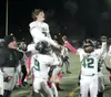 Jack Nash's teammates lift him on their shoulders as the celebrate a win over Juneau in the 2022 Division I state title game. Bruce Eggleston/matsusports.net