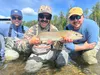 Anglers celebrate a victory on the water. Kyle Wilkinson/For the Frontiersman