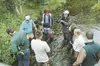 George Stover, executive director for Aqua Kids (center with camera) films with a crew during a recent outing at Cottonwood Creek. LINDA HENNING/Alaskans for Palme
