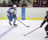 ROBERT DEBERRY/Frontiersman Palmer senior captain Ivan Good
brings the puck across the blue line during a win over West
Anchorage on Thursday. Robert DeBerry