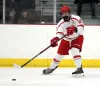 Wasilla's Matthew DeMaster moves the puck across the zone during a loss to Chugiak. Bruce Eggleston/matsusports.net