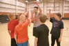 Colony High School graduate Damien Fulp and his fifth-grade basketball players — Daniel Wraith, Gage Brewster, Sam Henderson, Jasper Ross, Alex Hall and Starr Mills — give a cheer at the end 