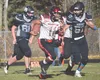 Houston's Tolupo Falaniko is chased by Nikiski's Caileb Payne on Saturday, Oct. 10, 2020, at Nikiski High School in Nikiski. Jeff Helminiak/Peninsula Clarion