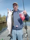 Gary Brell displays his September silver salmon caught with salmon roe under an ESB bobber. Courtesy of Andy Couch