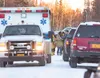 Karen Walters, 53, is escorted to a waiting Mat-Su Borough ambulance Saturday afternoon at the scene of a shooting and alleged home invasion on Wolverine Drive. Robert DeBerry