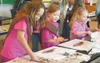 Girl Scouts participated in several craft projects at the Women
of Science event at Wasilla Middle School on March 8. Submitted
photo.