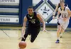 Colony junior forward Antonio Bush drives the ball down the court durng Colony's win over Soldotna Friday at the 2013 Northern Lights Region III Basketball Tournament at Soldotna High School.