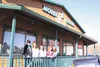Noisy Goose owners Bill and Glenda Nafus, left, are celebrating 25 years at their Glenn Highway location. They’re pictured here with longtime employee Davida Carrol, granddaughter Alyssa McKe