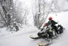 Tesoro Iron Dog competitor Tyler Aklestad heads off Big Lake and
Into the wood at the start of the 2009 Tesoro Iron Dog Sunday.