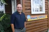 Alaska State Fair's new CEO, Jeff Curtis stands in front of the main office within the fairgrounds. Jacob Mann/Frontiersman