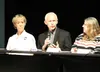 Alaska Chief Medical Officer Jay Butler address the audience at a Mat-Su Health Foundation-sponsored forum on heroin addiction at the Glenn Massey Theater Nov. 16, flanked by borough EMS Depu