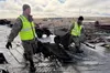 Alaska Organized Militia members assigned to Task Force Bethel continue recovery efforts, including retrieving boats the storm washed away and clearing debris at Chefornak, Alaska, Oct. 21, 2