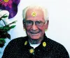 Stan Larimer joked that he may have to stop wearing the Wal-Mart
smiley face sticker on his forehead because he is getting "too
recognizable." He said he plans to work at Wal-Mart "as long as