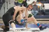 Palmer’s Aaron Molesky grapples with Colony’s Dawson Nash during a dual Thursday at Palmer High School. ROBERT DeBERRY/Frontiersman.com