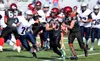 Houston senior Galvin Mulhaney runs for a gain during a nonconference win over Eagle River early in the season. Houston is a win away from clinching the Peninsula Conference title. Courtesy o