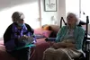 Janice Luce (left) reads a birthday card to Ida Stadler (right). Jacob Mann/Frontiersman