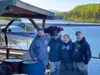 Steven Williams, Jeremy Scharlow, Gwen Grimes, and Nathan Harbour prepare to head to Dalteli Lake near the base of Denali for 4 months to build cabins and deal with PTSD issues. Courtesy of G