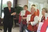 AARP Alaska volunteer president Terry Snyder, center, speaks in the Mat-Su office of Sen. Lisa Murkowski Monday. Snyder and nearly 20 other AARP Alaska members urged both Murkowski and Sen. D