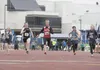 Morgan Dampier, center, sprints to a first-place finish during the 2012 Region III Track and Field Championships in May. The Wasilla High 2012 graduate was recently named the Gatorade Alaska 