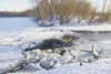 A four-door sedan sits submerged in the channel between the two
parts Wasilla Lake Friday afternoon. The vehicle was driven by a
teen whose name has not been released. There were no injuries.