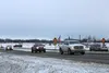 Valley residents participated in a rolling rally Saturday. The event was organized in opposition of the Municipality of Anchorage’s hunker down order. Tim Rockey/Frontiersman
