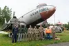 Members from Robins Air Force Base, Georgia gather in front of a Douglas C-47 Skytrain at the Museum of Alaska Transportation in Wasilla, June 13, 2024. The Skytrain is scheduled to move to i