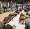 Ag Games participants compete to see who can eat a full pickle the fastest. Jacob Mann/Frontiersman