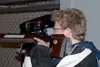 Adrian Baer, a member of the Palmer High rifle squad, aims
toward his target during practice at the Matanuska Valley Sportsman
Rifle Range last week. Photo by JEREMIAH BARTZ/ Frontiersman.