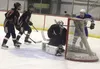 The puck takes a bounce into the Kenai Central net early in the second period of Kenai's 6-5 win over Palmer in the first round of the Big Lake Lions Christmas Classic Thursday at the Big Lak