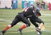 Houston’s Kyle Quincy makes a tackle during the Chugiak Stampede at Tom Huffer Stadium. The Hawks face the Soldotna Stars this weekend in Soldotna ROBERT DeBERRY/Frontiersman.com