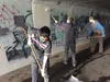 Valley Students paint over graffiti in Wasilla tunnel Photo courtesy of Ray Hafen
