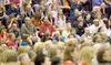 ROBERT DeBERRY/Frontiersman Mat-Su Borough School District staff
listen as keynote speaker Don Davis talks during the district’s
opening day celebration and professional development workshop 