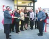 Dignitaries cut the ribbon on the new Palmer office of CRW Engineering Group.