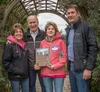From left, Cathie McCollum, Gov. Bill Walker, Jeannie Pinkelman and state Division of Agriculture Director Arthur Keyes pose for a photo Thursday recognizing the 2017 Alaska farm Family of th