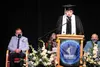 Burchell High School student speaker, Terry Bartlett shares the lessons he learned during his academic career during the 2021 graduation ceremony at the Menard Sports Center. Jacob Mann/Front