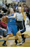 Palmer senior guard Kourtney Straight keeps the ball away from Soldotna’s Makayla Wong as she looks for an open teammate Thursday during quarterfinal competition at the 2013 Northern Lights C