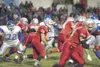 ROBERT DeBERRY/Frontiersman Wasilla’s Devon Teeling runs up the
middle during Wasilla’s 23-22 victory over Palmer Friday during the
33rd Potato Bowl at Veteran’s Memorial Field in Wasilla. Ro