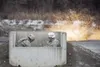 Paratroopers assigned to 3rd Battalion, 509th Parachute Infantry Regiment, take cover while conducting M67 fragmentation grenade live-fire training at Joint Base Elmendorf-Richardson, Alaska,