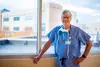 Rodney Badger, M.D., interventional cardiologist with Mat-Su Heart, discusses heart care between seeing patients in his clinic in the medical plaza on the campus of Mat-Su Regional Medical Ce